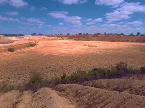 Expansive clay extraction landscape at Heidelberg Materials Australia featuring exposed earth, dry clay surfaces and surrounding natural terrain used in the development of calcined clay materials.